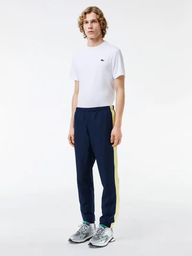 Jogging colorblock bleu marine jaune homme - Lacoste | wimod