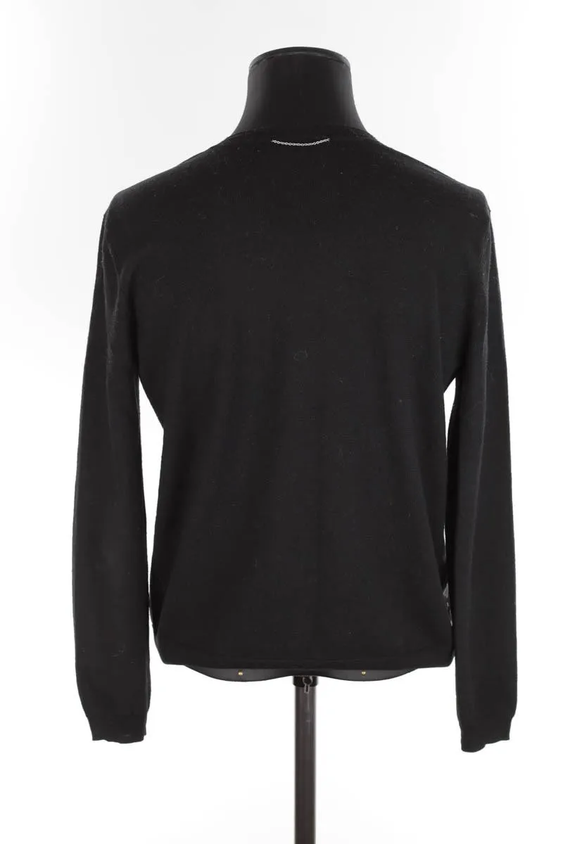 Pull-over en laine The Kooples noir. Matière principale laine. Taille 34.